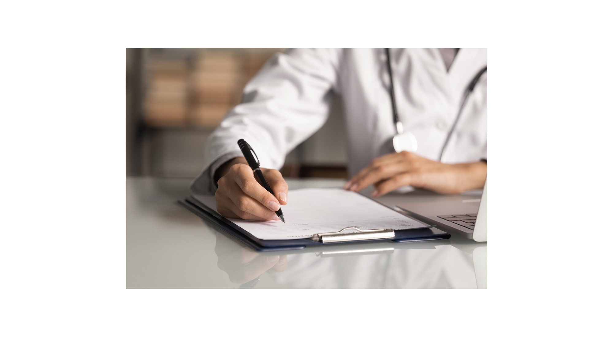 Clinician documenting in a patient chart