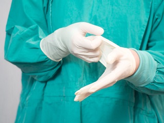 Surgeon Changing Gloves