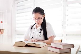 Clinicians reviewing evidence-based literature