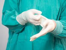 Surgeon Changing Gloves